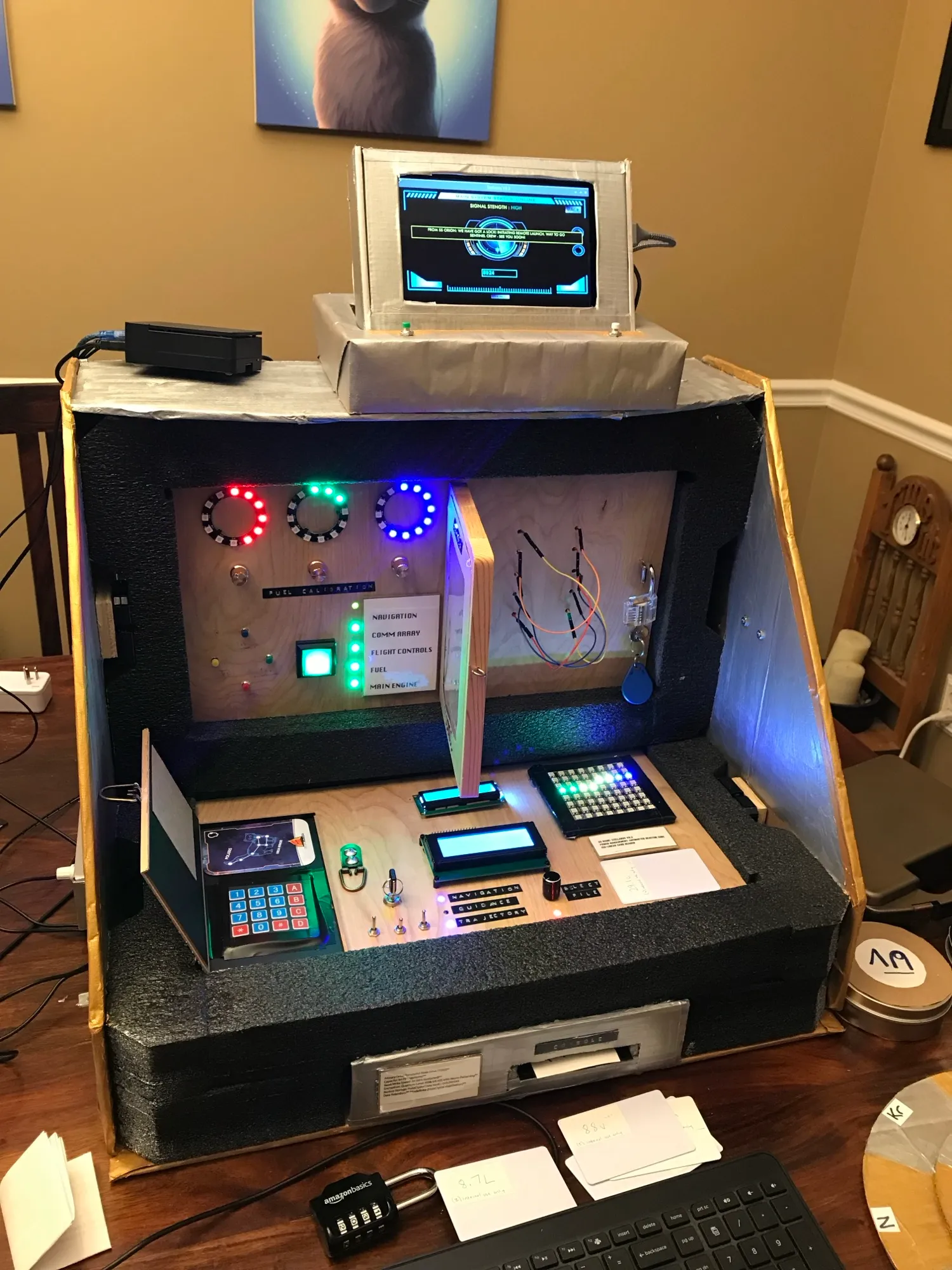 The full build with every game solved, LEDs, rings, and displays all lit